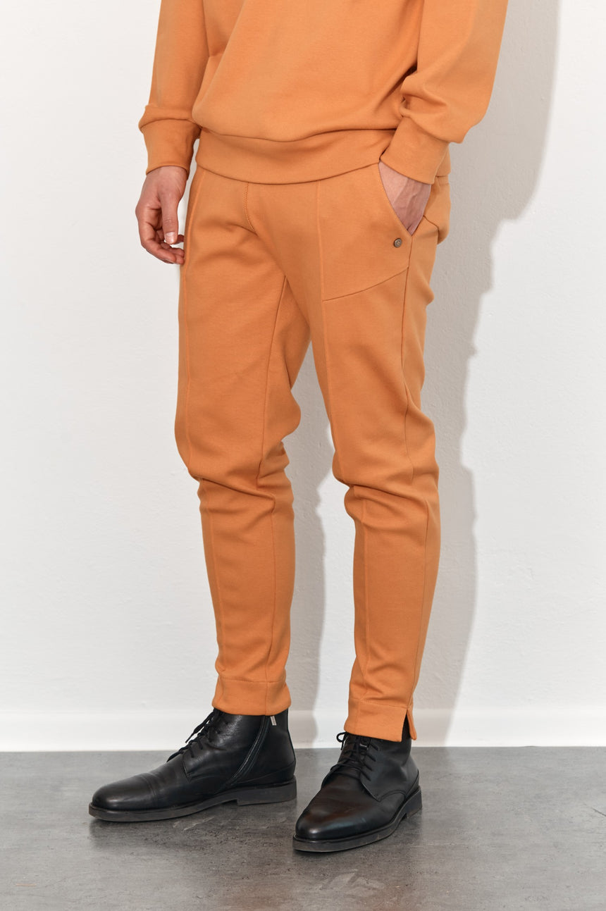 NUGGET ORANGE TROUSERS UNITE